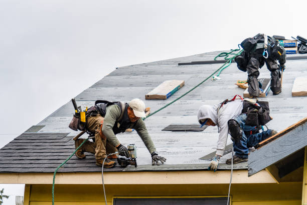 Professional Roofing technician working in Bay Shore, NY